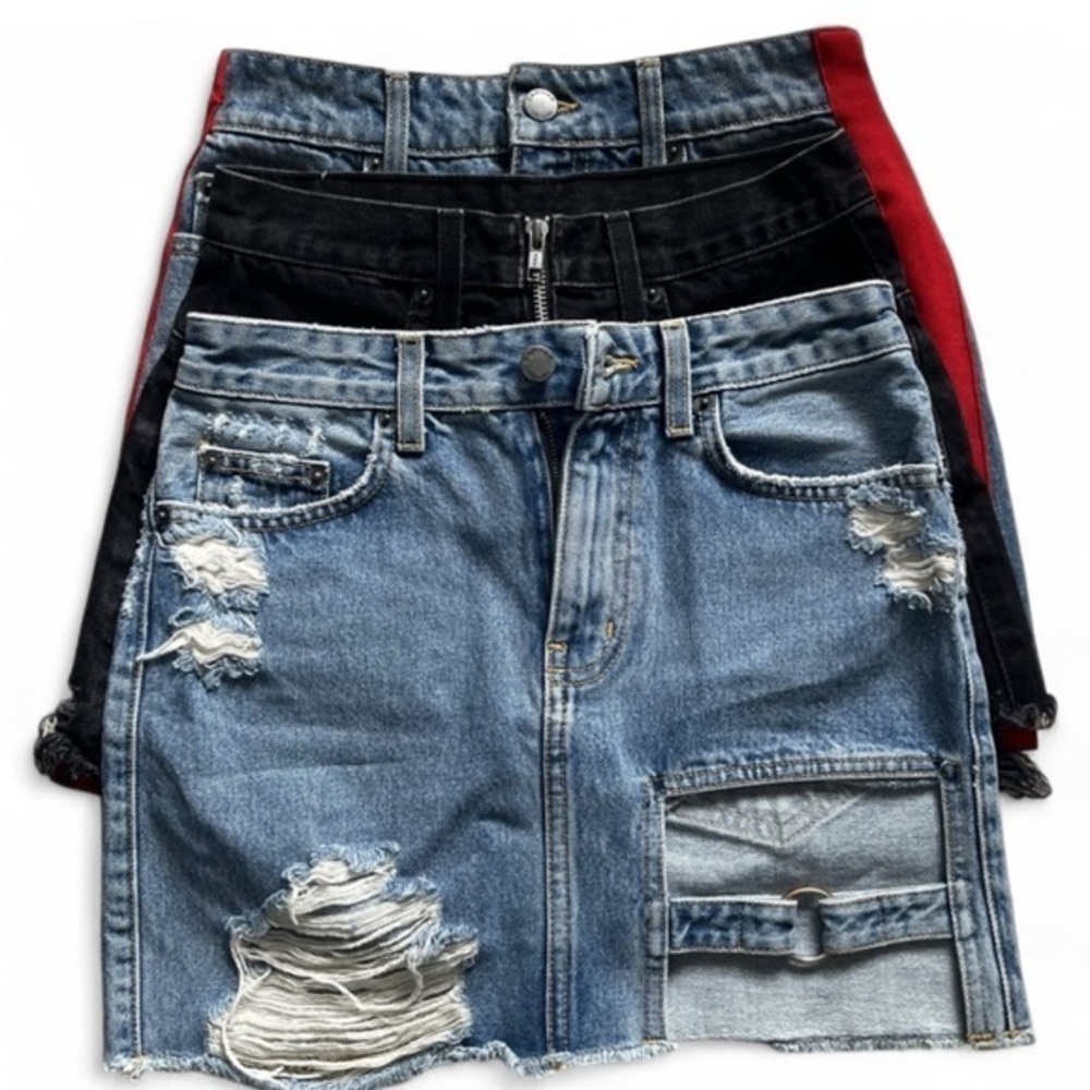 Three Carmar denim mini skirts, size 25. Two blue and one black.